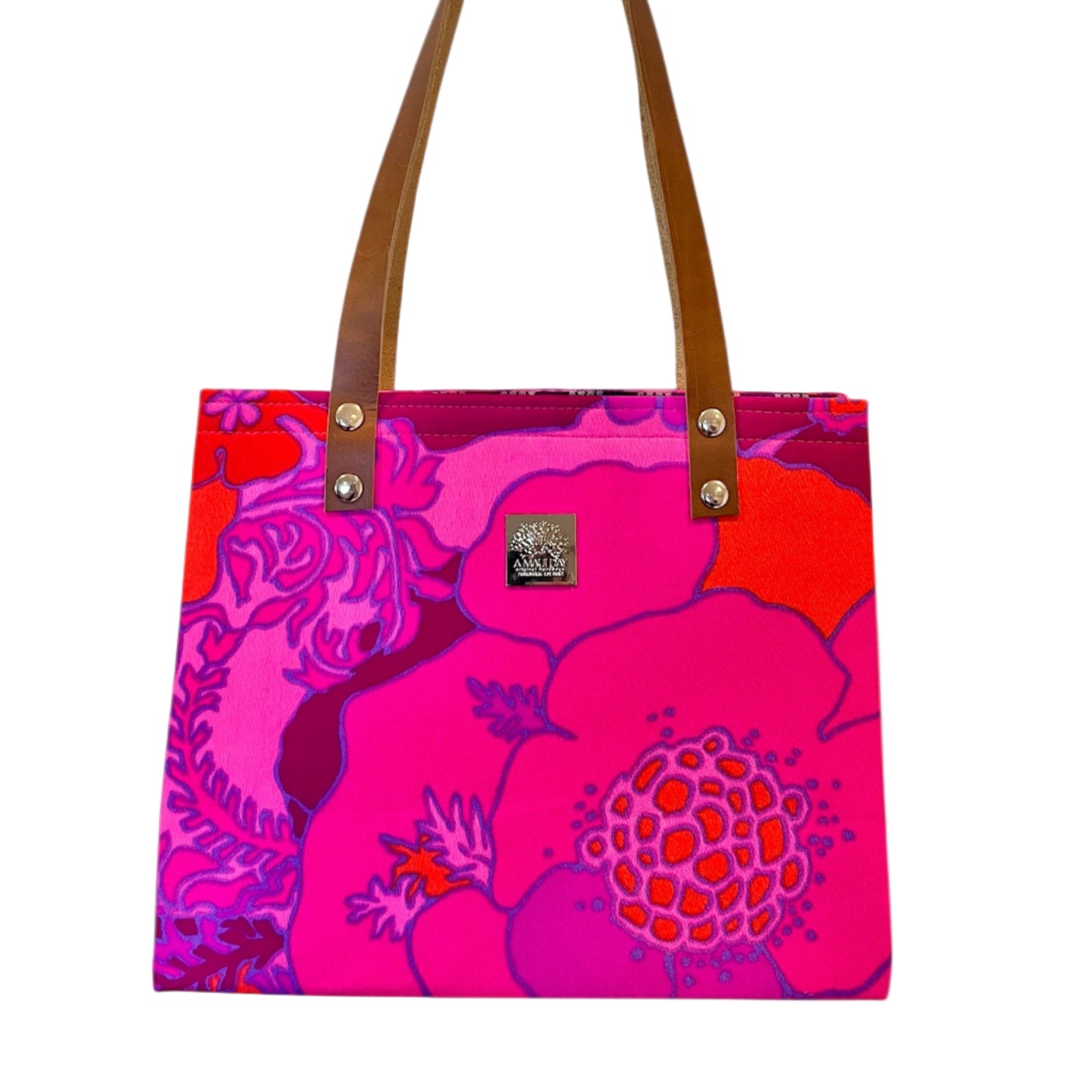 Tote bag with pink floral design and brown handles on a white background